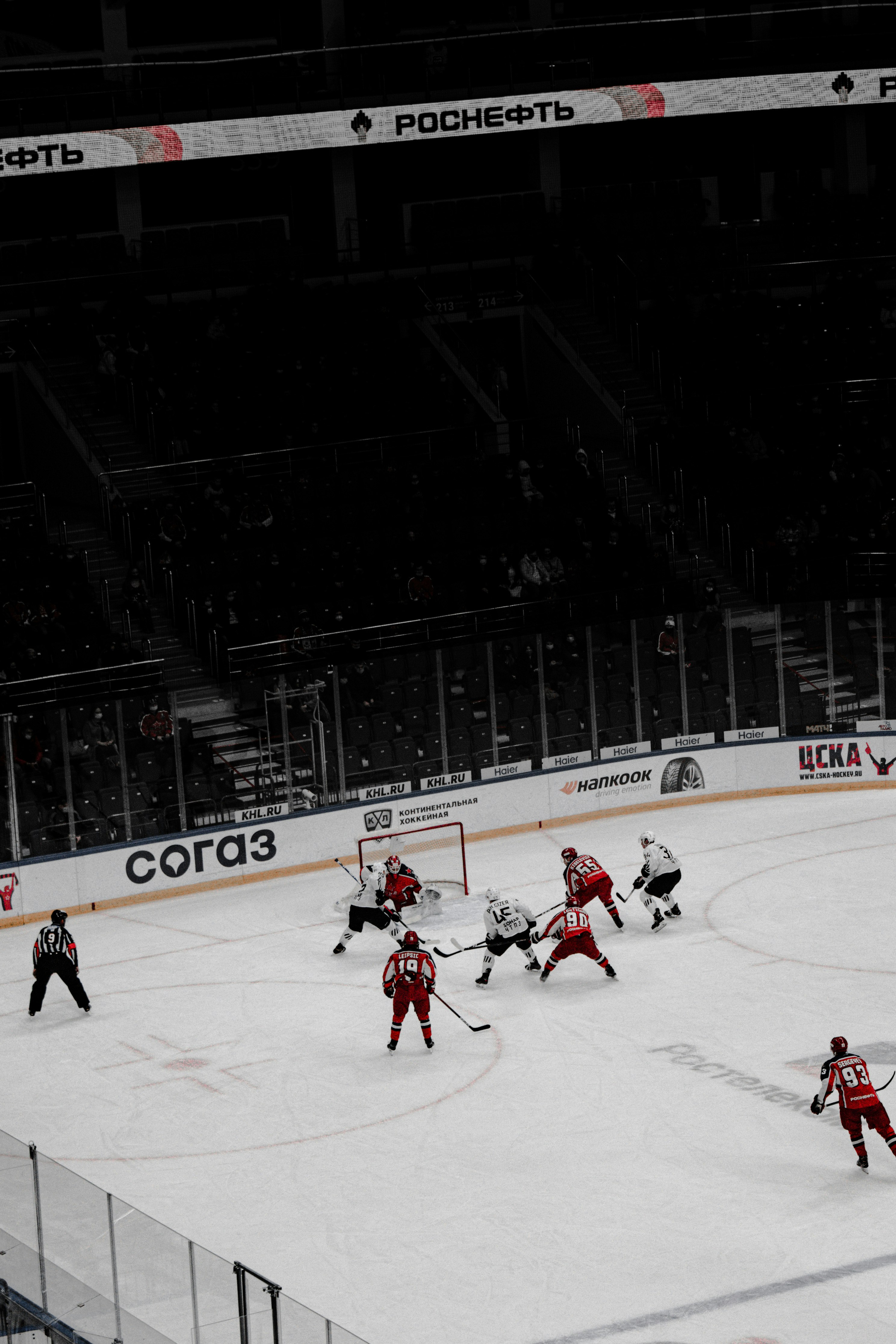 ice hockey players on ice hockey field